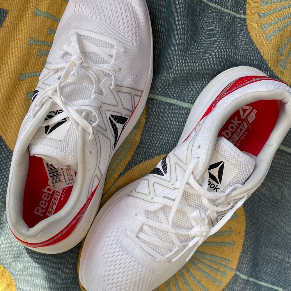 Reebok women’s White and Red Athletic Shoes